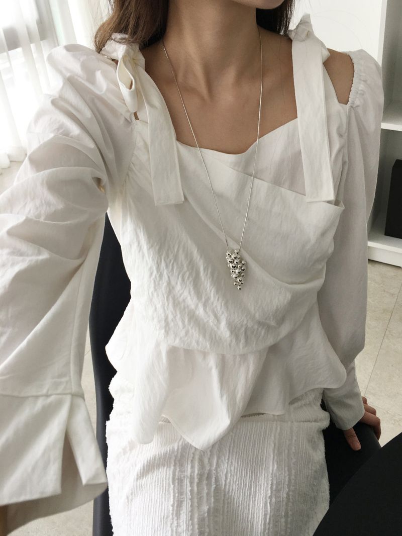 nobiyaka（ノビヤカ）の「Ribbon wrap blouse（Tops）」