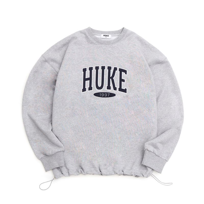 HUKE(フック)の「HUKE ロゴ MTM (グレー)(トップス)」