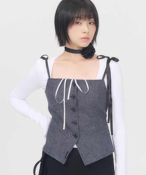 ZIZEMUSEUM（ジゼミュージアム）の「リボンボタントップ（トップス）」