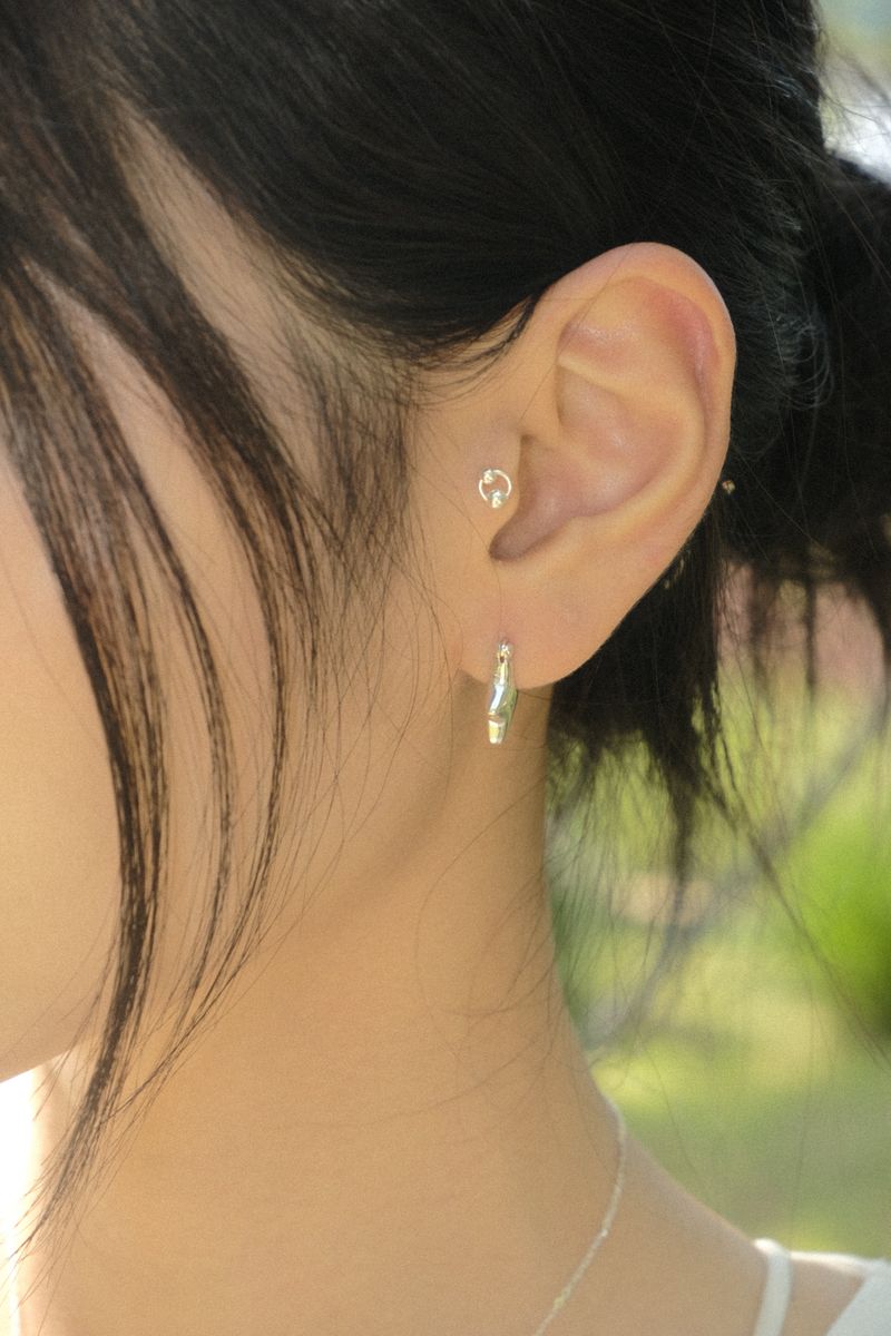 METALIC STAR POCKET EARRINGS