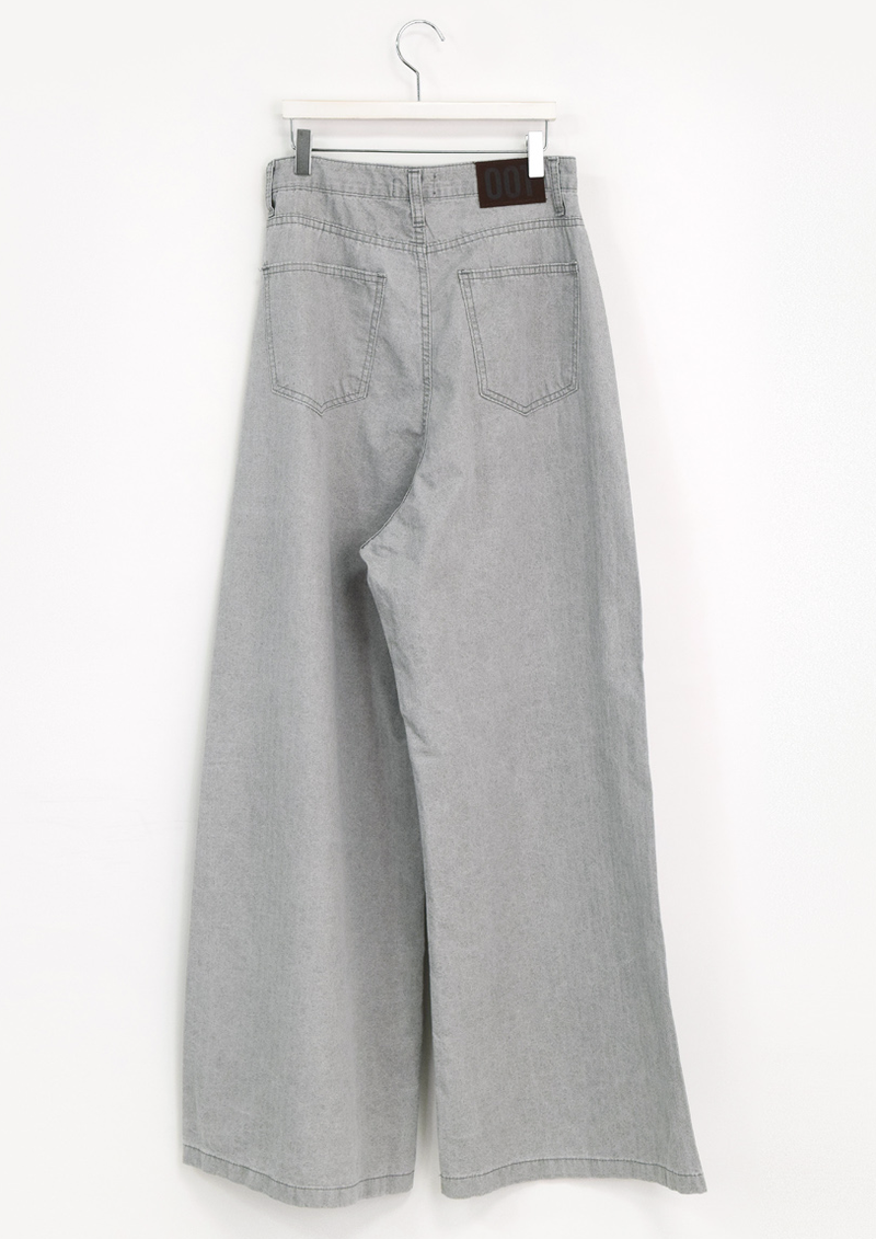 over wide gray pants