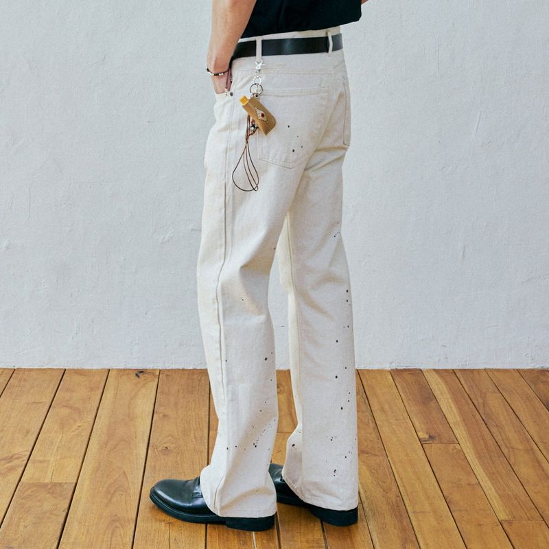 KND(ケイエンド)の「97 lc splatter bootscut denim pants ecru(Pants)」