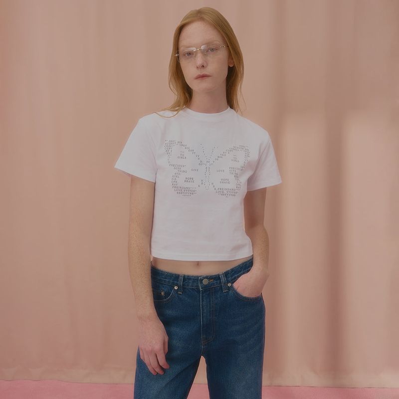NCOVER(エンカバー)の「TEXT BUTTERFLY CROP TSHIRT-WHITE(Tops)」