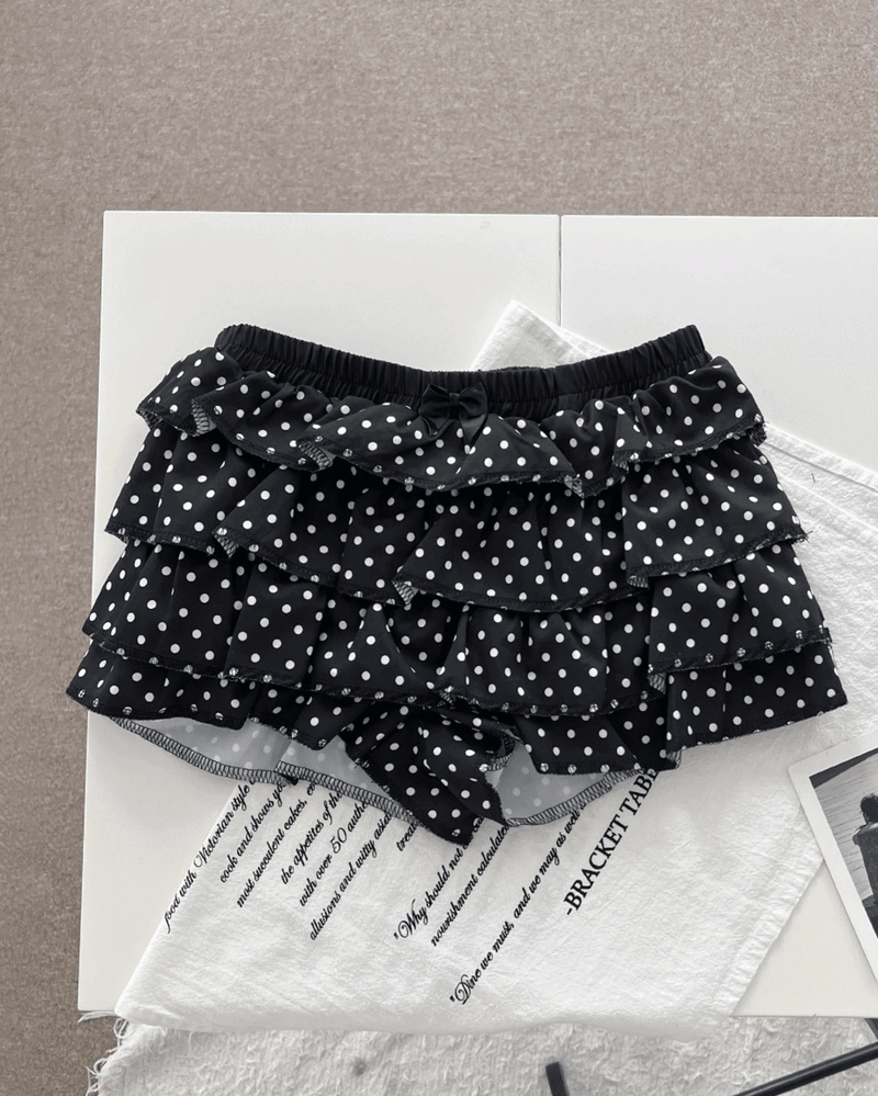 GUSTA（グスタ）の「DOTINA Ruffle Dot Mini Pants Skirt (Black)（Skirts）」