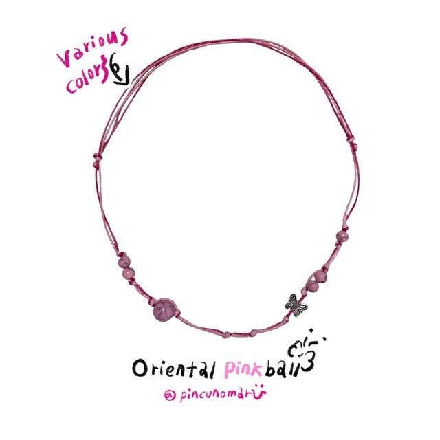 PINCUNOMARU(ピンクノマル)の「Oriental pink ball(Accessories)」