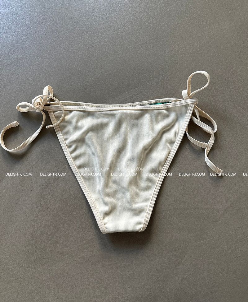 a set of 2 layered colored bikinis