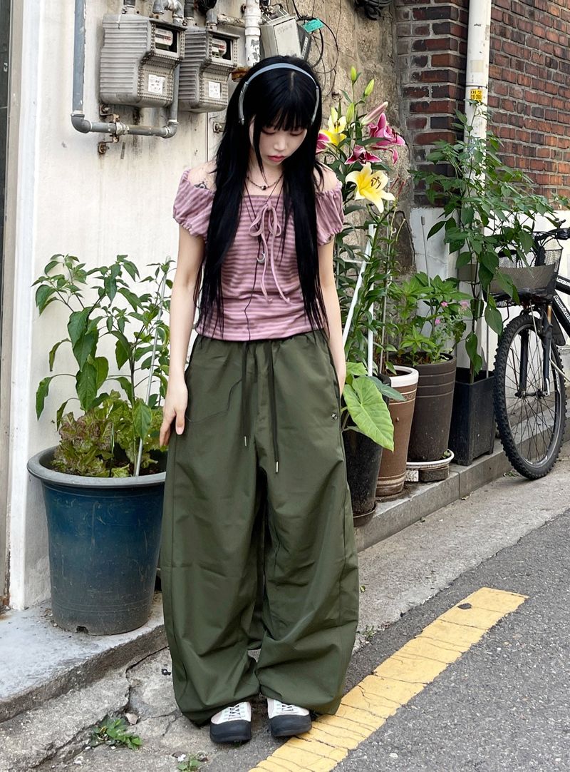 heenytsuki（ヒニツキ）の「Irmi Nylon Bizo Snap Wide Pants（Pants）」