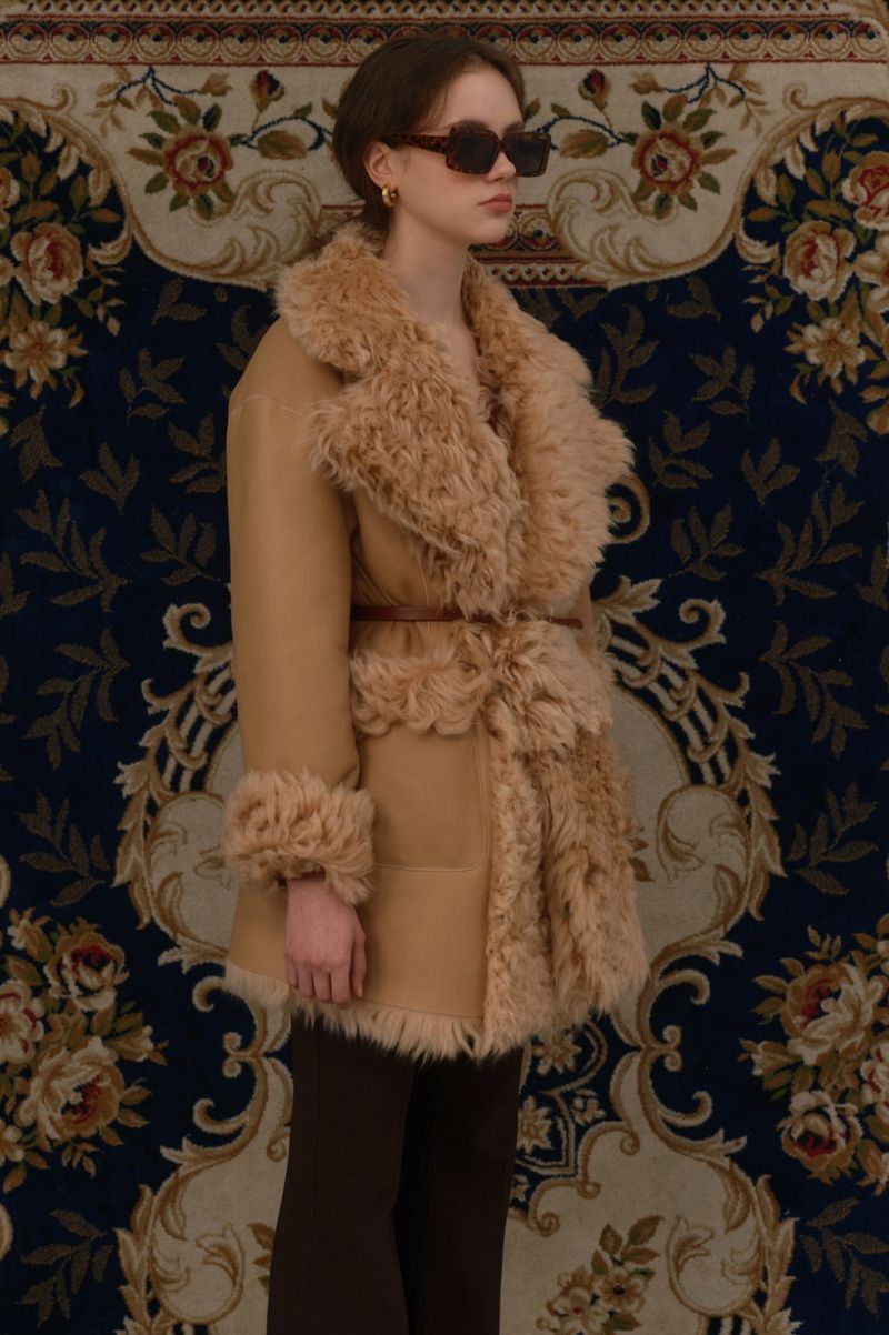 Reversible shearling coat