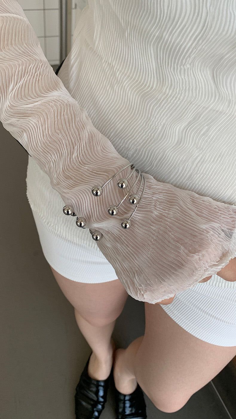 Silver ball piercing bangle