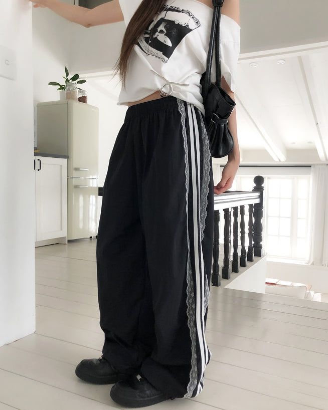ULAN(ユレン)の「Ruffy Lace Track Nylon Pants(Pants)」