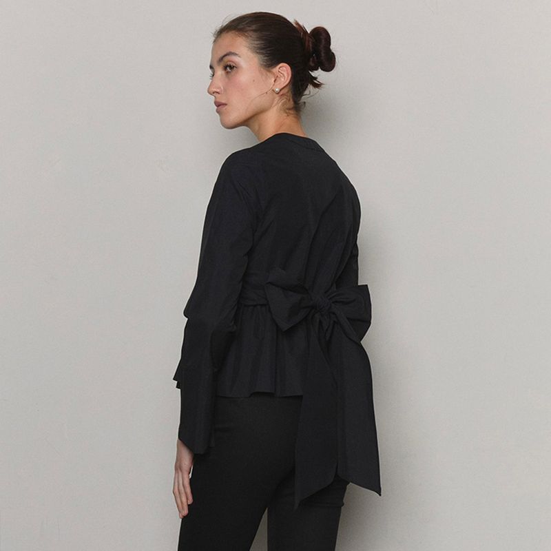 SSOKIN（ソキン）の「Bow Belted Peplum Blouse _ Black（Tops）」