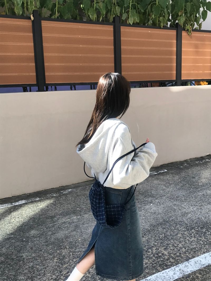 Juana washing long skirt