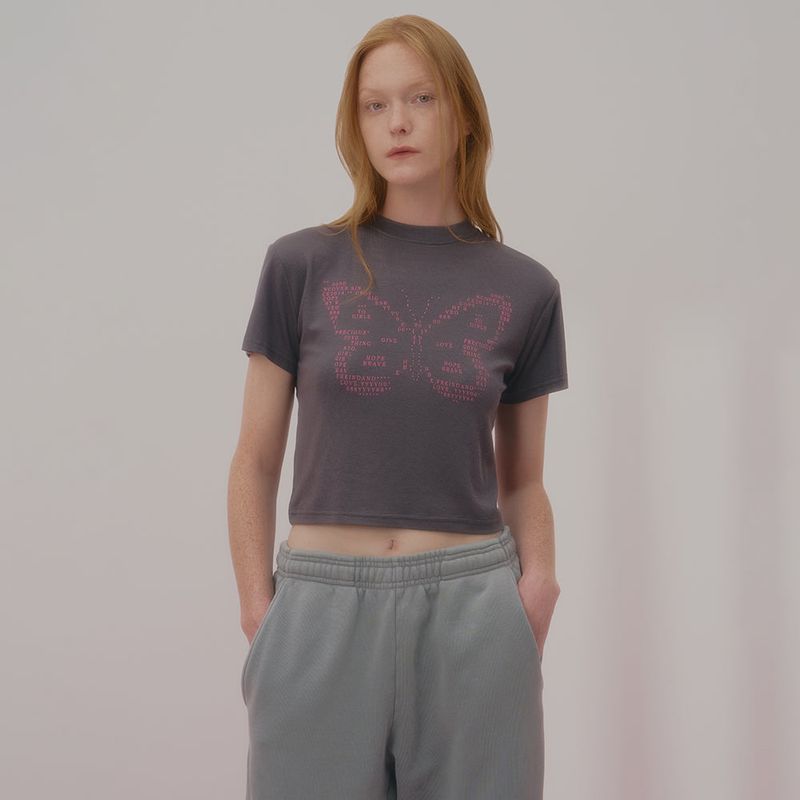 NCOVER(エンカバー)の「TEXT BUTTERFLY CROP TSHIRT-CHARCOAL(Tops)」