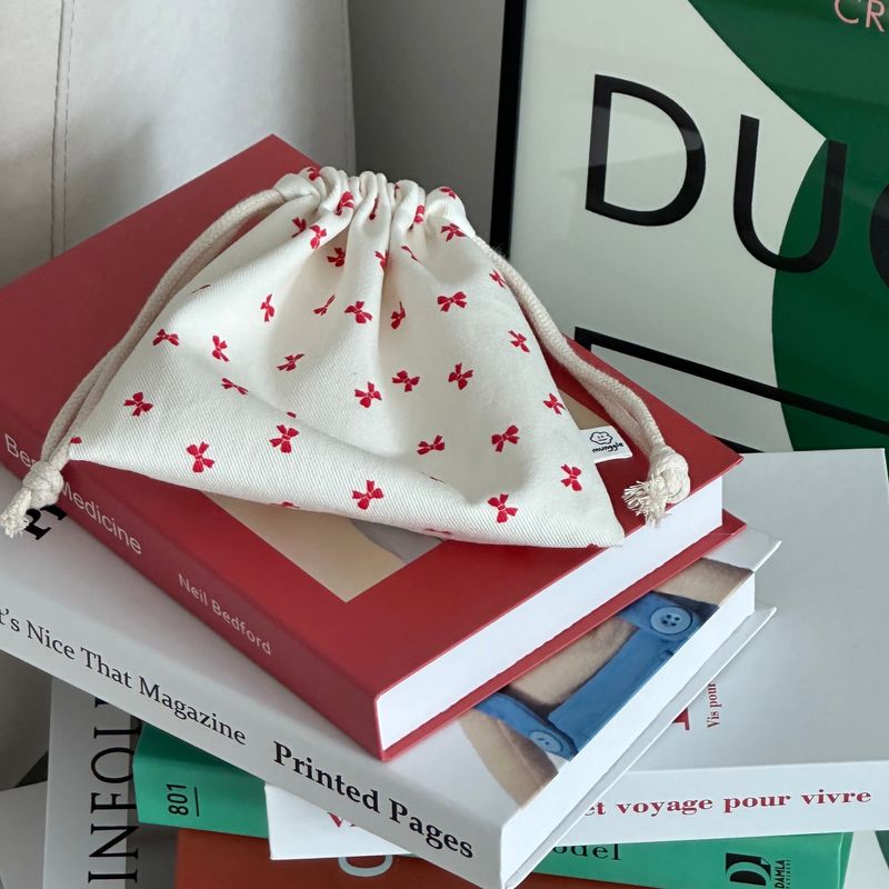 RED RIBBON STRING POUCH