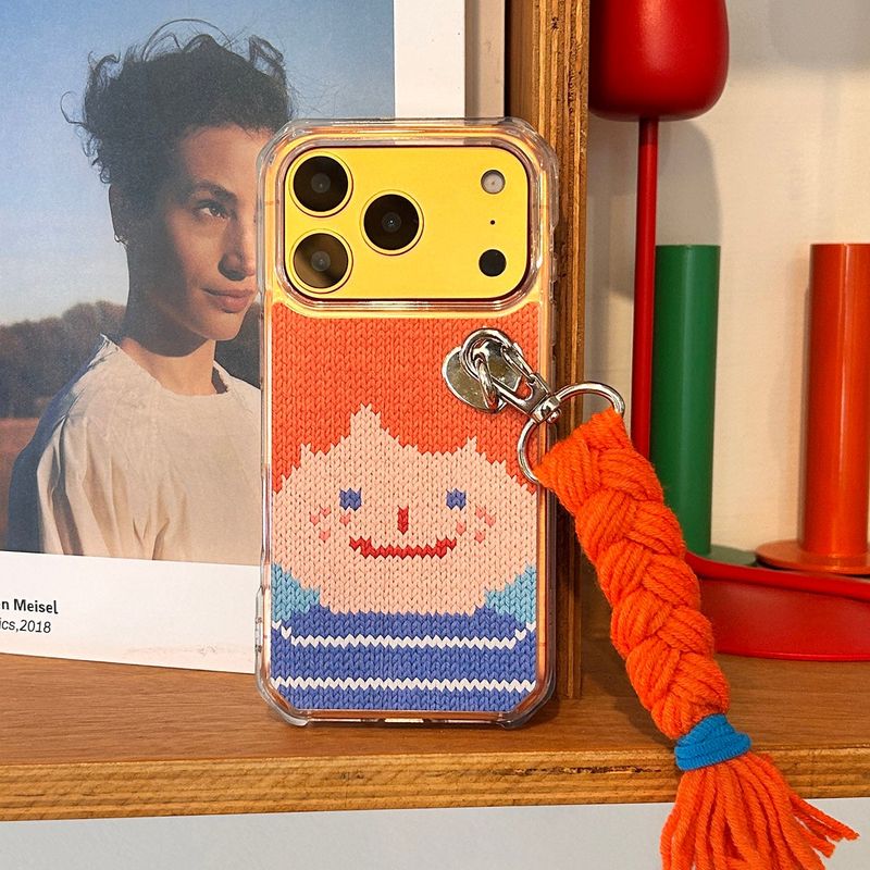 DELPHIN(デルフィン)の「スマイリーフェイスハードジェルケース - VER.2 (+HAIR KEYRING SET) - オレンジ(スマホグッズ/小物)」