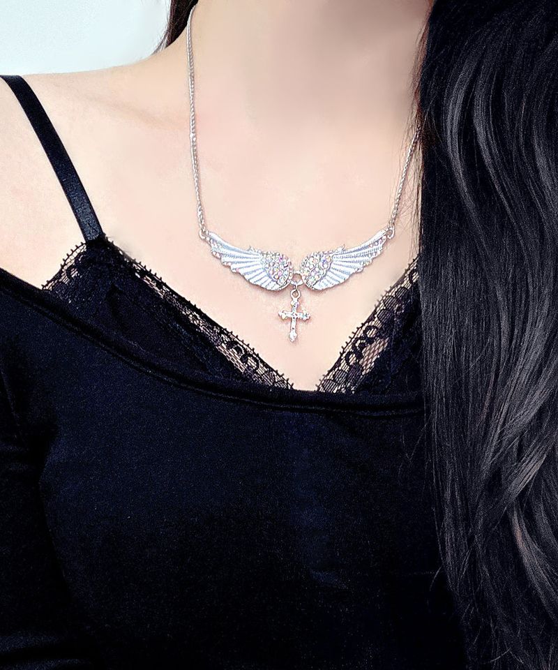 Angel wing cross necklace