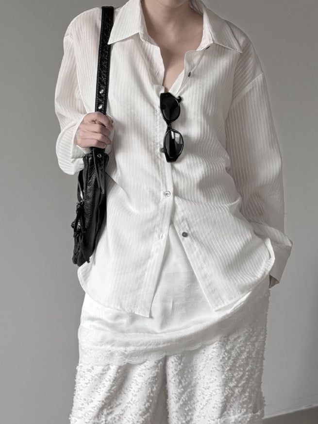 mnem（ムネム）の「Kelo Stripe Belt Shirt（Tops）」