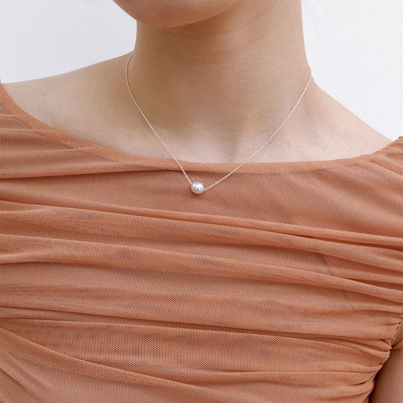 PEARLSONATE(パーソネイト)の「Signature Polkadots Necklace, White(Accessories)」