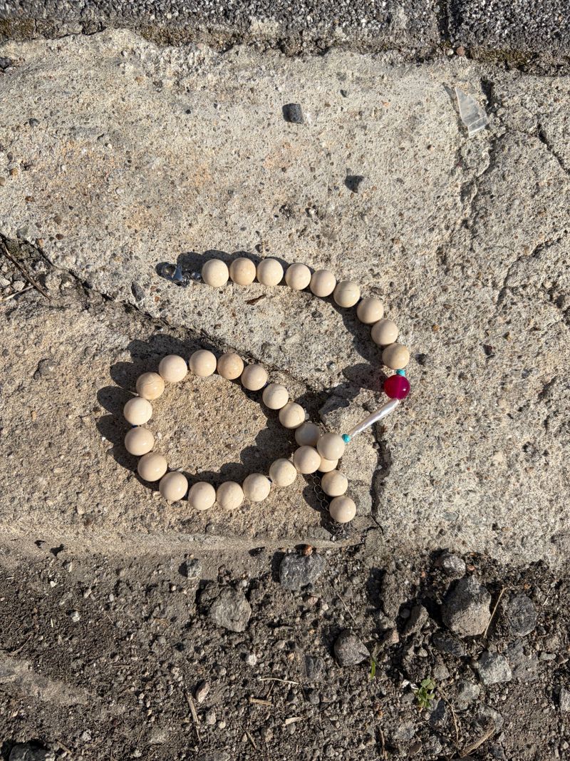 red pearl necklace