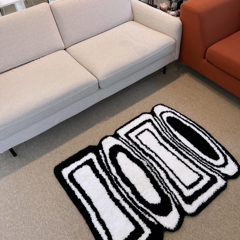 Black & white oval square tufting rug