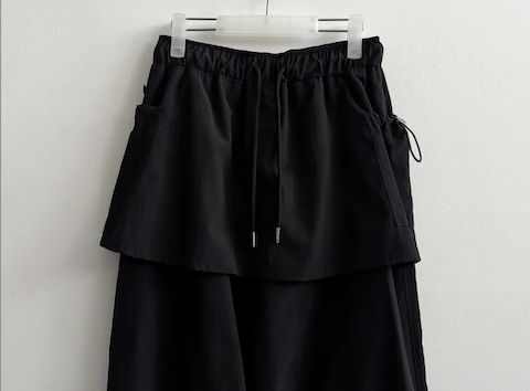 Log banding layered pocket skirt pants