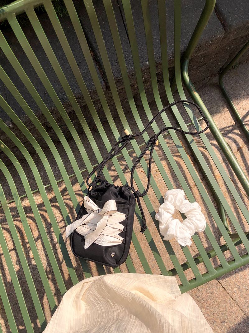 ovuni（オーブニ）の「Mini sneaker ribbon bag_black（Bags）」