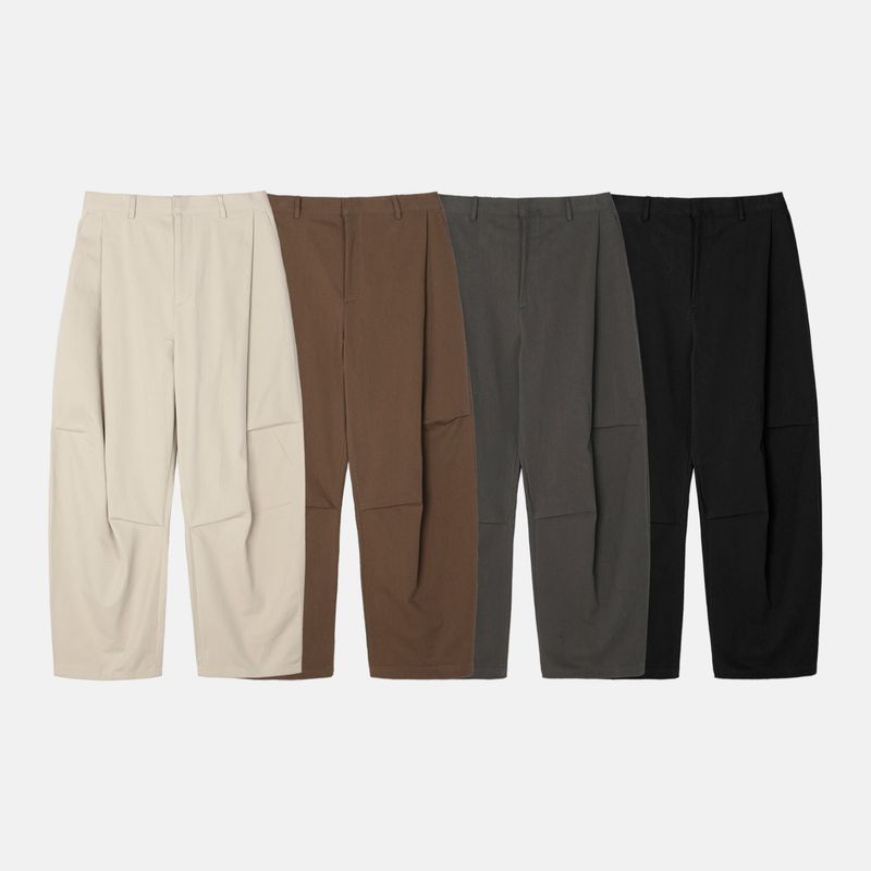 Unbalanced pintuck curved pants