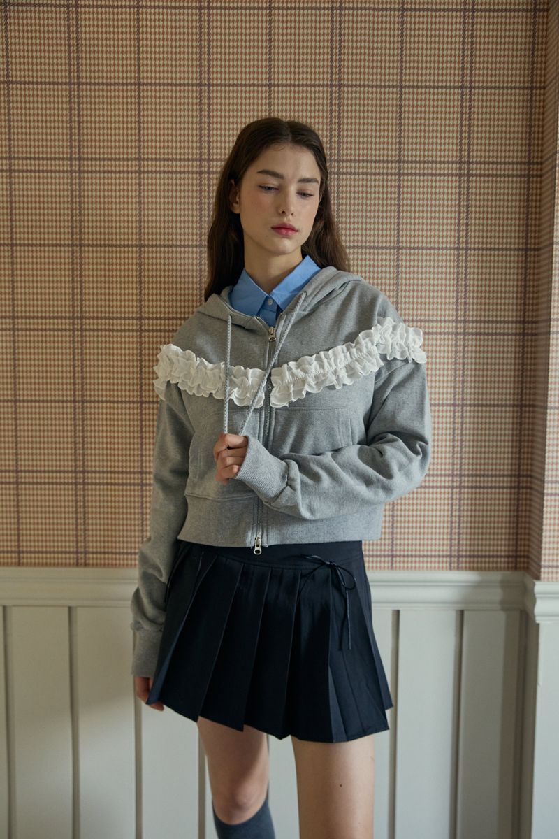 PINK PINEAPPLE（ピンクパイナップル）の「FRILL HOODED ZIP UP (2 COLORS)（Tops）」