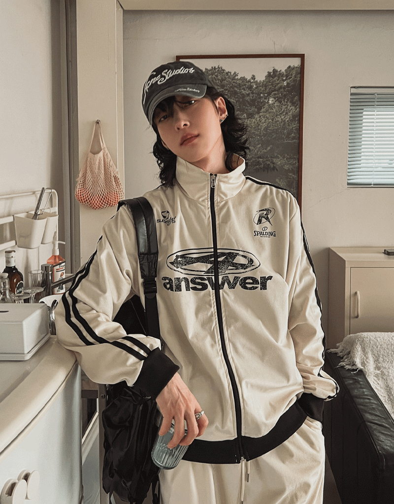 2PLAN（ツープラン）の「Spell velour color matching track jersey（Tops）」