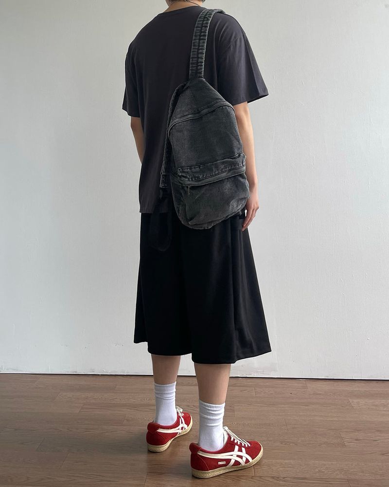 Washed denim backpack
