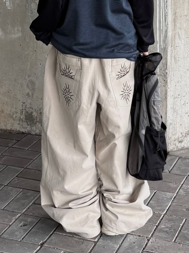 spica raw-edge embroidery pants
