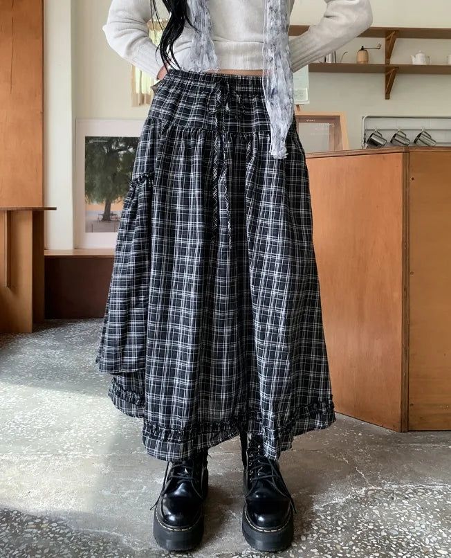 ULAN（ユレン）の「Maeve Unbalance Check Long Skirt（Skirts）」