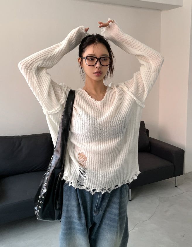 Reverse damage V-neck knitwear