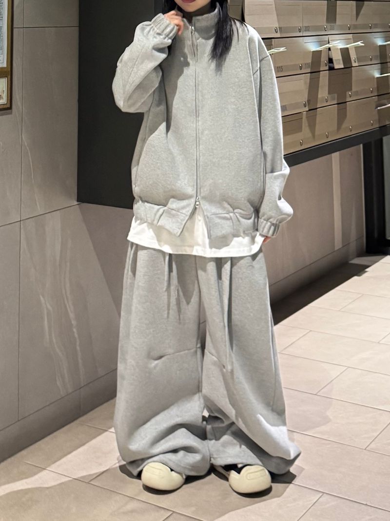 curved high-neck blouson zip-up