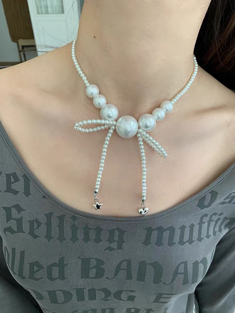 House of haus（ハウス オブ ハウス）の「ホワイト パール リボン ネックレス（アクセサリー）」