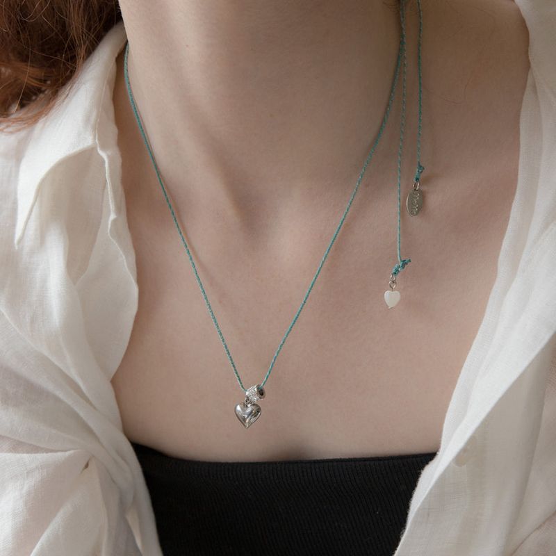 MerryMotive(メリーモチーブ)の「Heart point melange string necklace(Accessories)」
