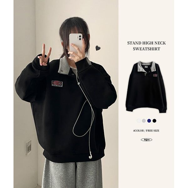 hijjoo（ハイチュー）の「Mile Snap High Neck Patch Color Matching Sweatshirt（Tops）」