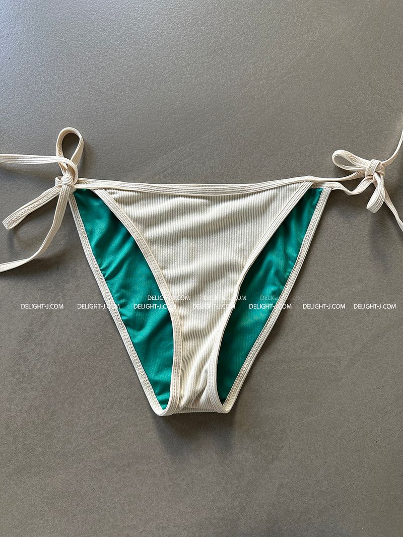a set of 2 layered colored bikinis