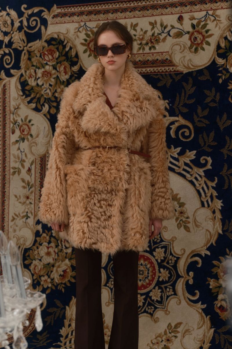 Reversible shearling coat