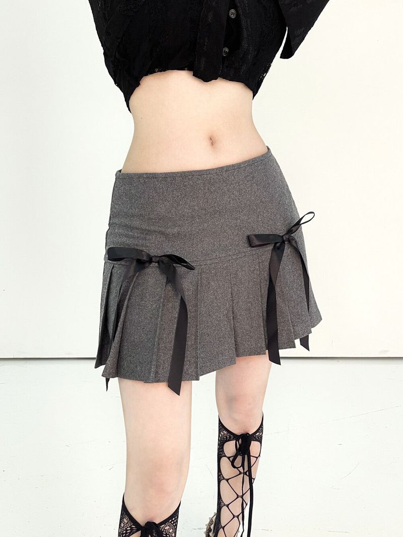 Seow（ソウ）の「1021. Wool Double ribbon pleats mini sk (2color)（Skirts）」
