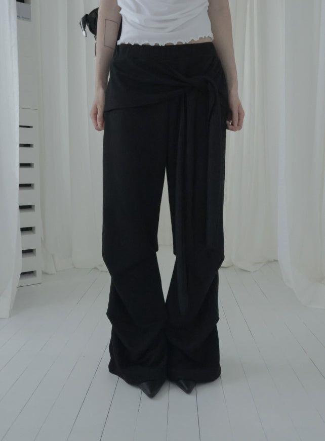mnem（ムネム）の「Warr Pintuck Wrap Bootcut Pants（Pants）」
