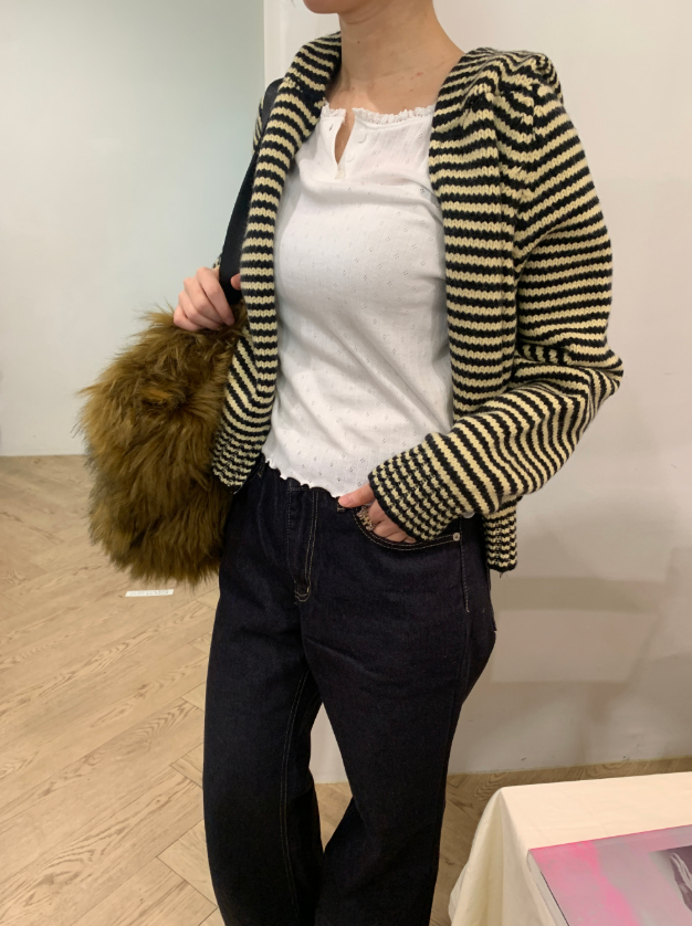 howu（ハウユ）の「ウィミー配色フードニットジップアップ（3c）（Tops）」