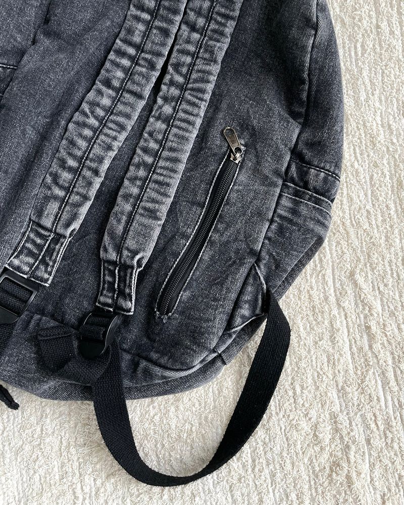 Washed denim backpack