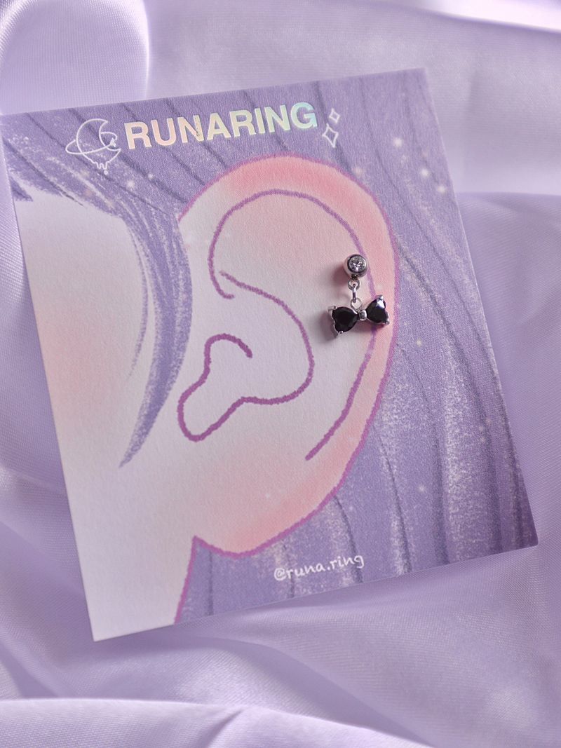 Surgical steel black ribbon piercing