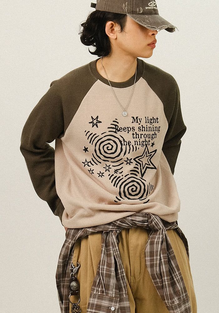 SEMIKAJI（セミカジ）の「HO スタープリンティングラグランニットロングスリーブ（トップス）」