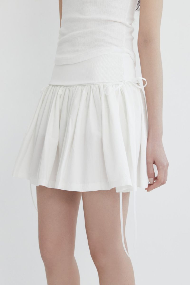 Innermuseum（インナーミュージアム）の「Ribbon tie cotton shirring skirt (WHITE)（Skirts）」