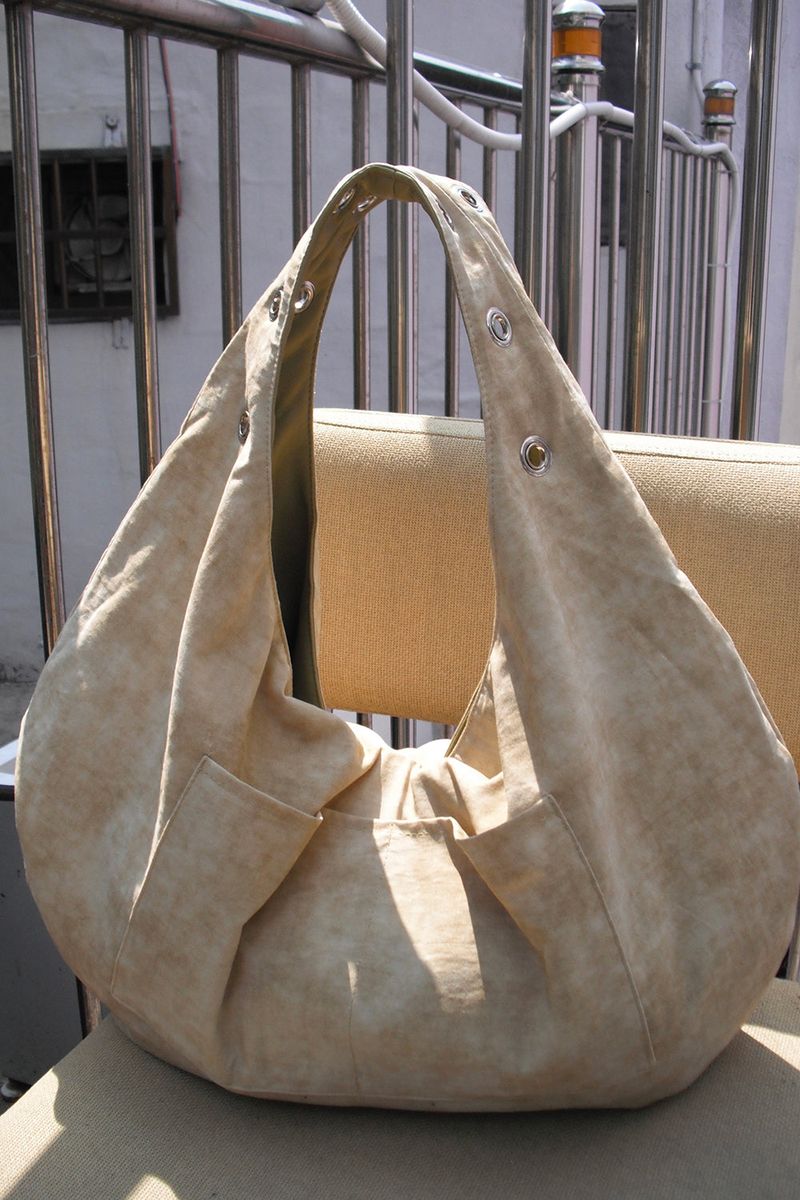 EYELET LEATHER BAG - LARGE (BUTTER)