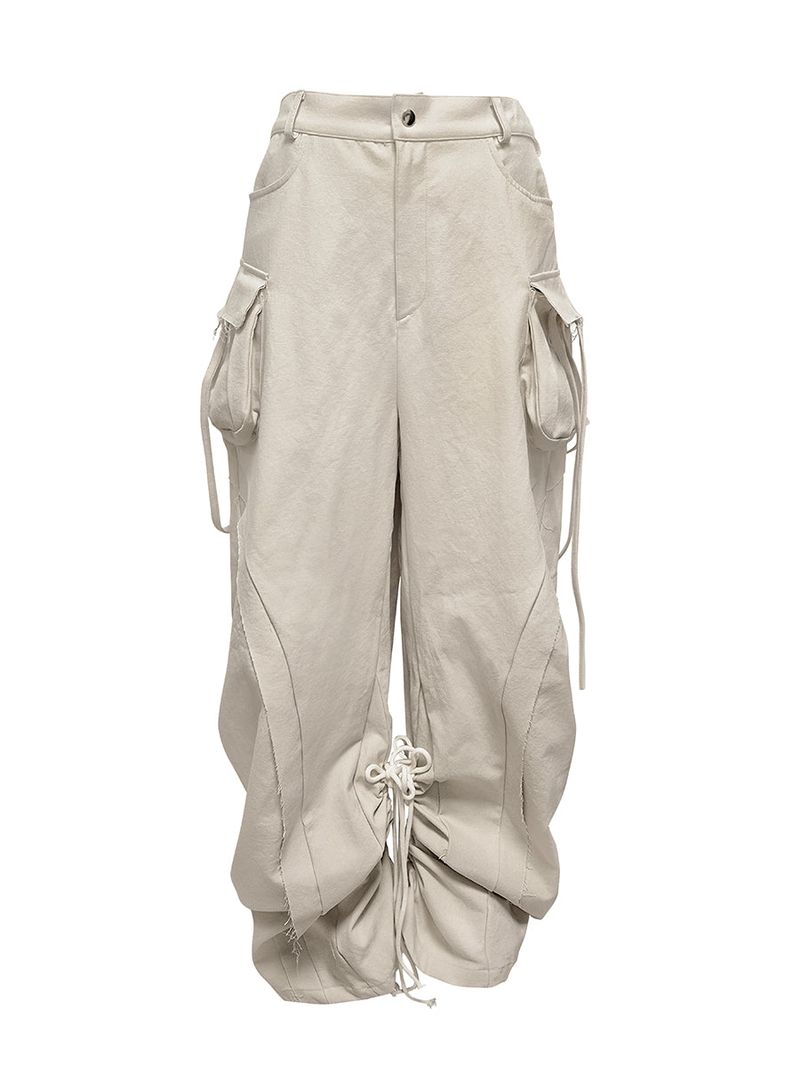 JUNGDO（ジョンド）の「 CUT OUT STRING CAGO PANTS . DRITY BEIGE（Pants）」