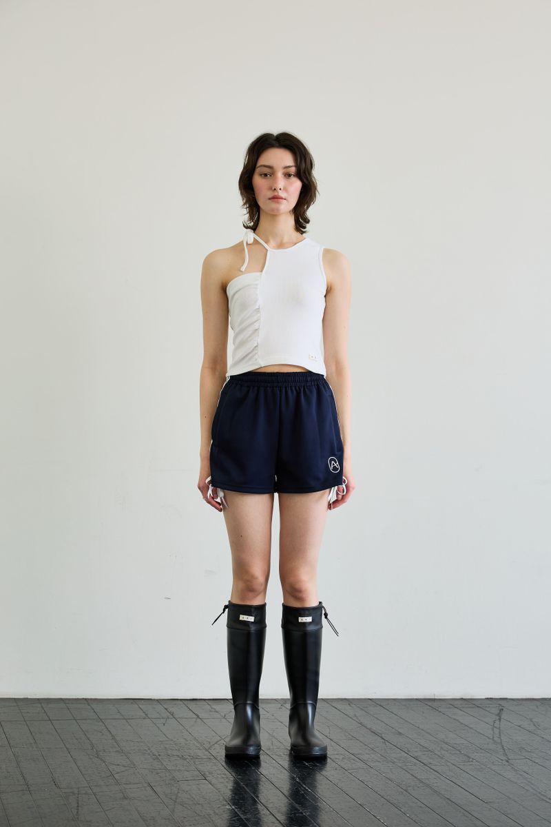 ARIKIM（アリキム）の「BEBE UNBALANCE SLEEVELESS TOP / WHITE（Tops）」