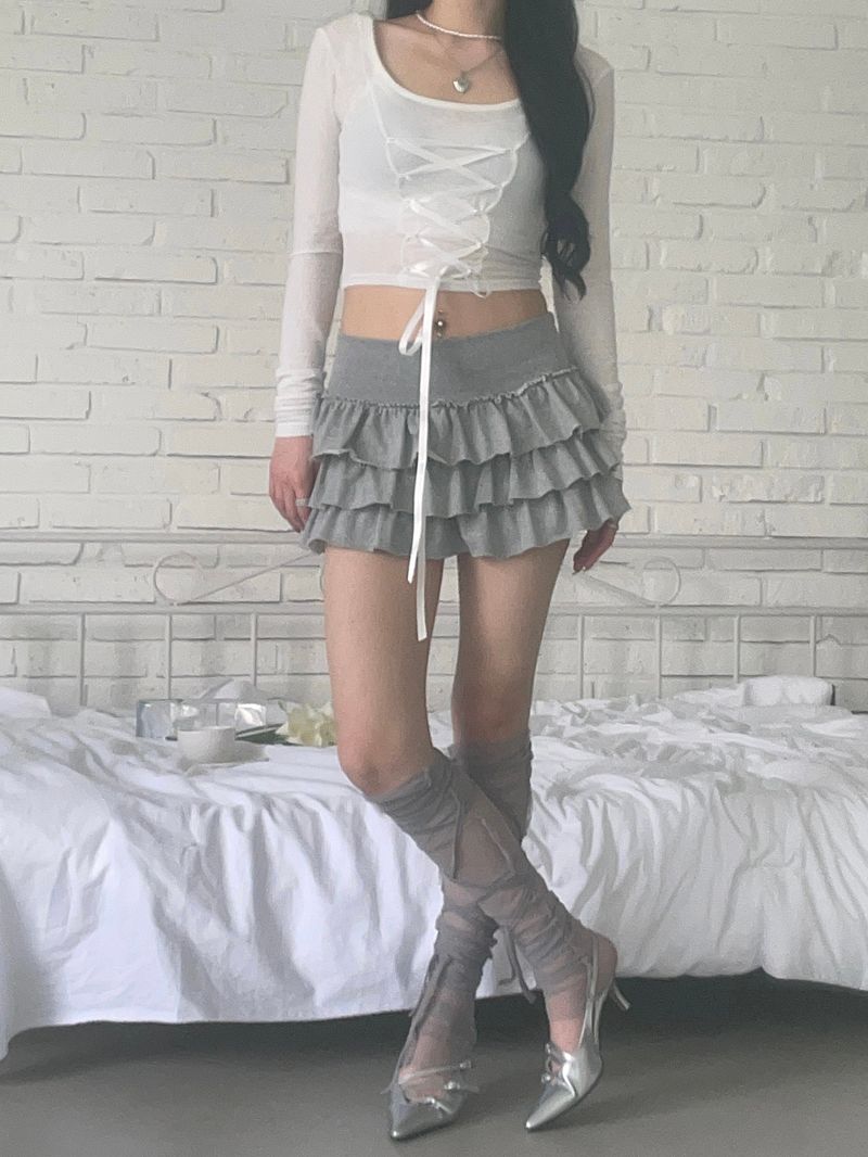 Strap mesh leg warmer